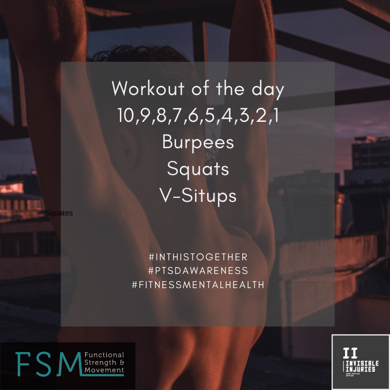 man doing overhand heaves on outdoor gym at night