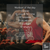 muscly man in red tank top in bicep pose in front of mirror with workout in text
