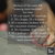 hand closeup of person indoor rockclimbing with workout in text