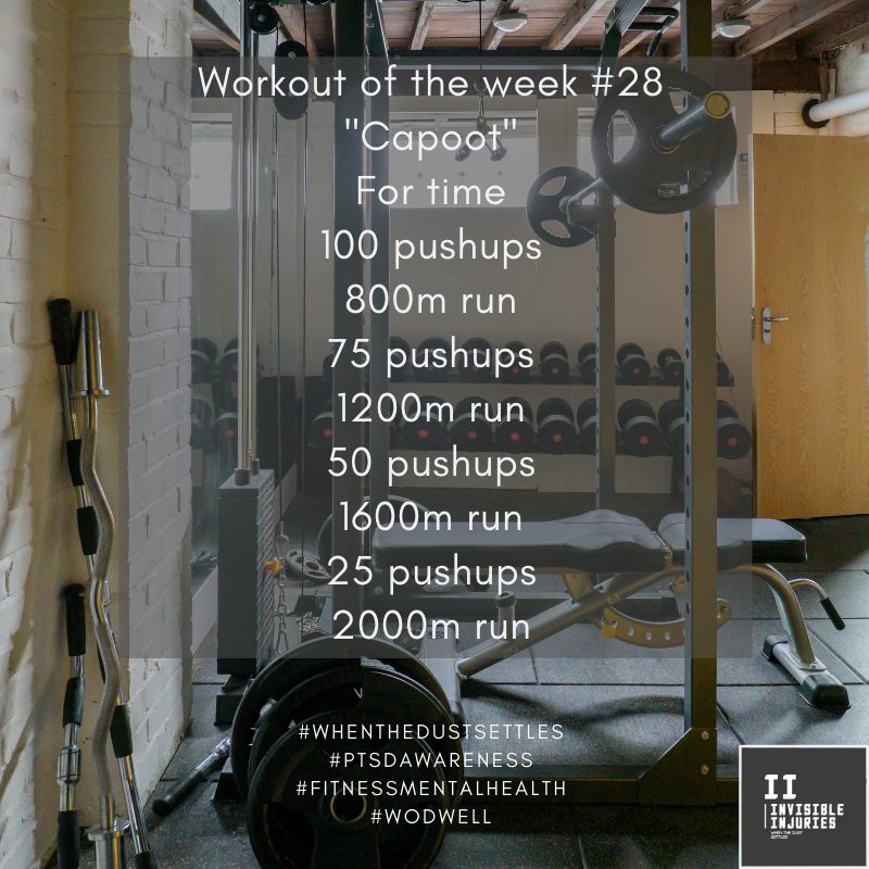 weightrack and gym equipment with workout in text