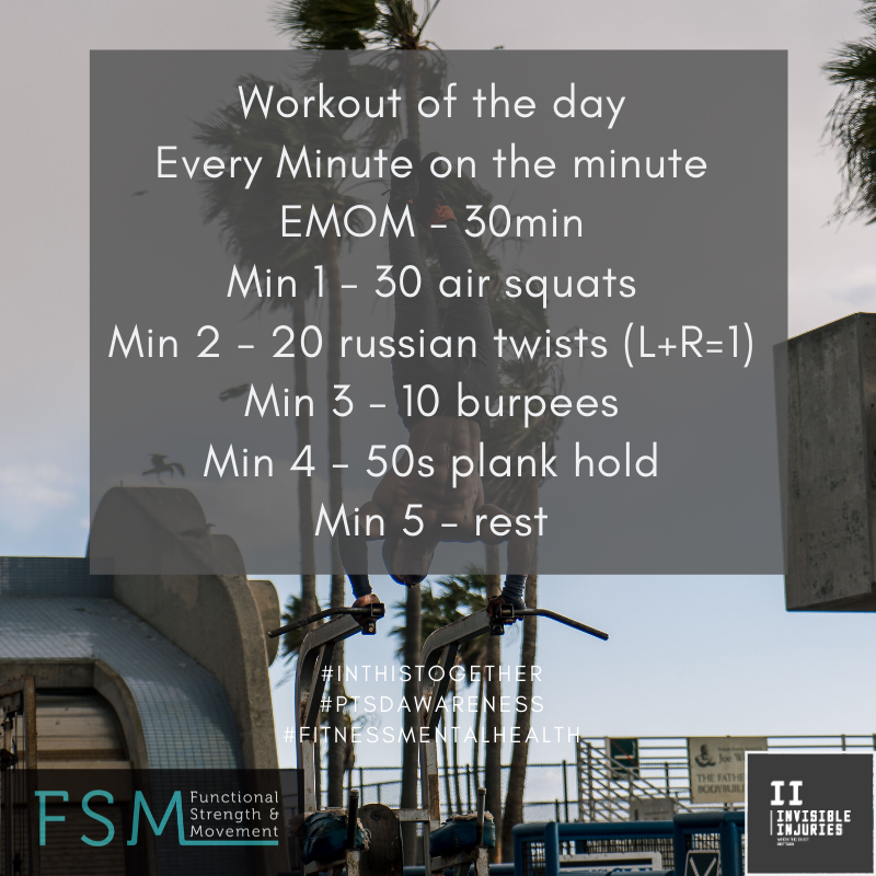 man doing handstand on parallel bars at venice open beach gym